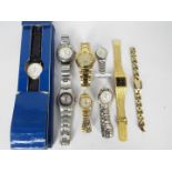 A collection of various wristwatches, lady's and gentleman's.