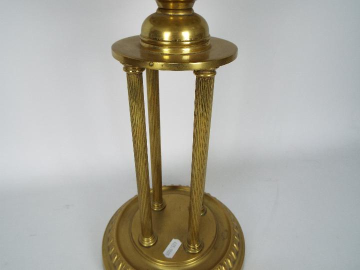 A brass oil lamp on circular base with four column supports, the shade decorated with game birds, - Image 9 of 11