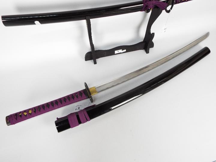 A pair of good quality reproduction Samurai swords comprising katana and wakizashi, - Image 7 of 9