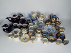 A collection of various tea wares, predominantly Oriental, two boxes.