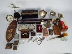 A mixed lot of collectables to include Egyptian style ornaments, aeroplane desk ornament / trophy,