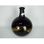 A 19th century, amethyst glass, apothecary carboy / demijohn of bulbous form,