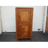A twin door pine corner cupboard measuring approximately 184 cm x 97 cm x 43 cm.