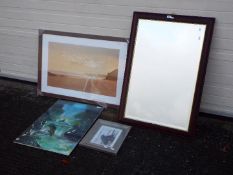 A wood framed bevel edge wall mirror, approximately 100 cm x 66 cm and three prints of varying size.