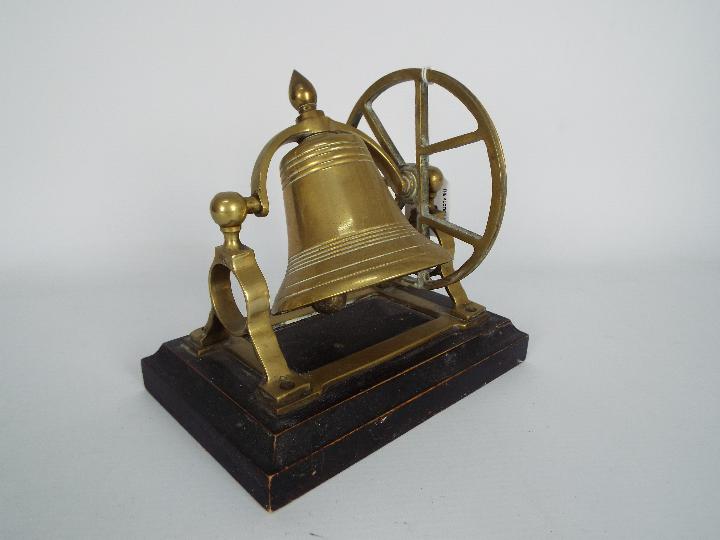 A brass desktop or counter top bell on wooden stand, - Image 3 of 3