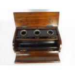 A wooden desk tidy / inkwell stand bearing badge of the 12th Royal Lancers.