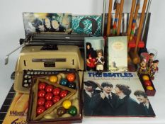 Lot to include vintage Remington typewriter, croquet set, small scale snooker balls,