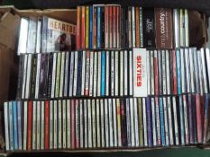 A collection of various CD's, one box.