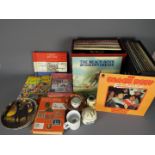 A mixed lot comprising vinyl records to include The Beach Boys, The Stylistics, Paul Simon,