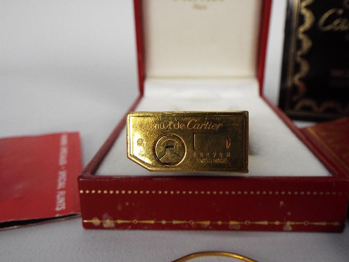 A Must de Cartier Briquet cigarette lighter contained in original box with paperwork. - Image 5 of 6