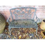 Gardenware - a white painted metal garden seat, the back with rose decoration,