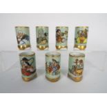 A set of seven miniature vases depicting the Happy Gods, each approximately 5 cm.