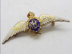 A yellow metal and enamel RFC sweetheart brooch stamped 9ct, approximately 2.5 grams all in.