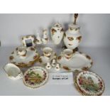 A large quantity of Royal Albert Old Country Roses dinner and tea wares to include plates, cups,