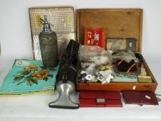 A sewing box with contents, vintage linen, Hoover Dustette and similar.