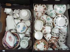 Two boxes of mixed ceramics, predominantly dinner and tea wares.