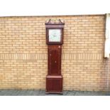 A late 18th/ early 19th century 8-day longcase clock signed to the 13 inch square painted dial for