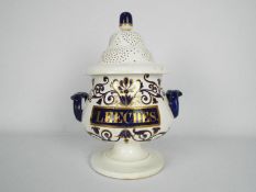 A 19th century Staffordshire pottery leech jar and cover with scroll handles,