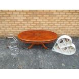 A oval topped coffee table with inlaid decoration, approximately 43 cm x 120 cm x 70 cm,