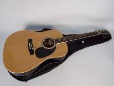 A Maestro acoustic guitar by Gibson, contained in carry case.