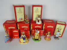 Seven boxed Royal Doulton Bunnykins figurines to include Land Girl, Sundial Bunnykins,