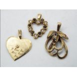 Two 9ct gold stone set, Heart pendants and one further, unmarked yellow metal, stone set pendant,