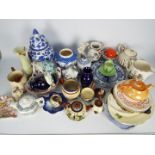 Two boxes of mixed ceramics to include Carlton Ware, Sylvac, motto ware and similar.