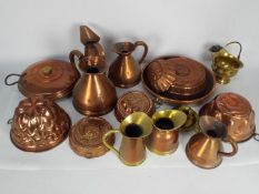 A collection of antique and vintage metalware, copper, brass to include measuring jugs,