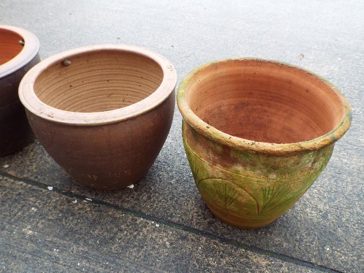 Four garden planters of cylindrical form, largest approximately 30 cm x 40 cm. - Image 3 of 3