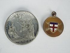 A white metal commemorative medal, Queen Victoria Coronation, designed by Joseph Davis,