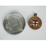 A white metal commemorative medal, Queen Victoria Coronation, designed by Joseph Davis,