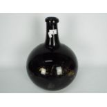 A 19th century, amethyst glass, apothecary carboy / demijohn of bulbous form,