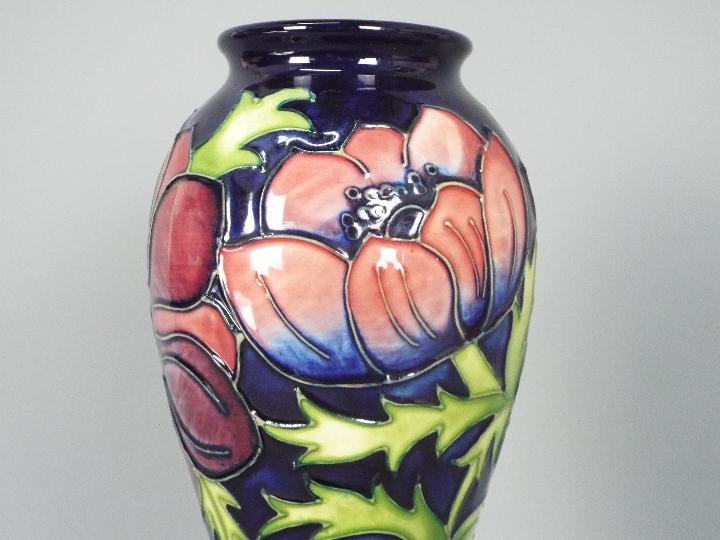 Moorcroft - A Moorcroft Pottery vase of inverted baluster form decorated with anemone against a - Image 2 of 3