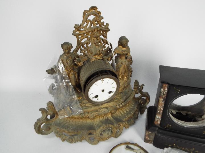 A figural mantel clock for restoration and a mantel clock case. - Image 3 of 4