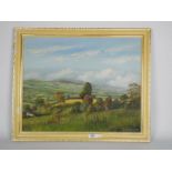 A framed oil on board landscape scene, titled verso The Vale Of Clwyd From Llanbedr Towards Denbigh,