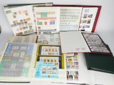 Philately - A collection of albums containing used stamps, GB, Netherlands, Jersey and similar.