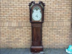 An early 19th century 8-day longcase clock, Roman numerals, arched, rolling moon dial,