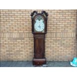 An early 19th century 8-day longcase clock, Roman numerals, arched, rolling moon dial,