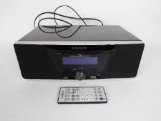 A Roberts digital radio / CD player, with remote.