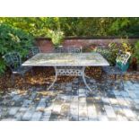 Gardenware - a white painted metal garden set comprising rectangular table and six chairs,