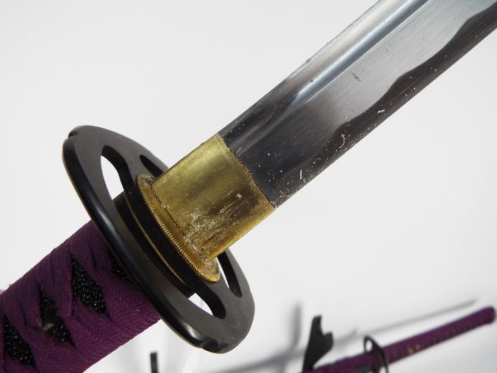 A pair of good quality reproduction Samurai swords comprising katana and wakizashi, - Image 4 of 9