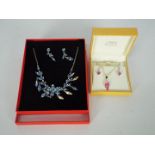 Silver 925 - a Silver necklace with stone set pendant and matching earrings,