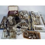 A collection of plated ware to include flatware (with some stainless),