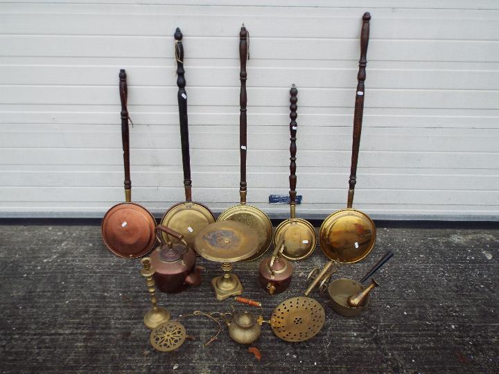 A quantity of metalware, copper and brass.