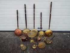 A quantity of metalware, copper and brass.