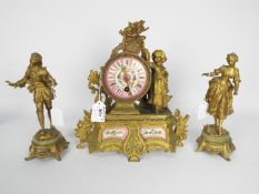 Early 19th century mantel clock garniture,