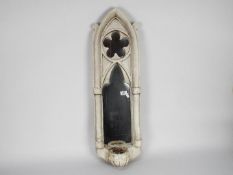 A stone effect, gothic style wall mirror / candle holder by Simon Jameson for Lost Worlds,