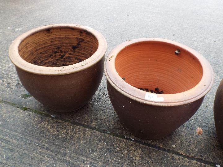 Four garden planters of cylindrical form, largest approximately 30 cm x 40 cm. - Image 2 of 3