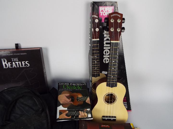A quantity of vintage sheet music, two guitar carry cases and a boxed ukulele. - Image 2 of 4