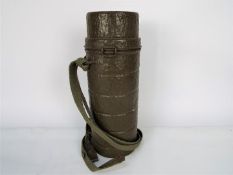 A German Bundeswehr gas mask canister, approximately 33 cm (h).